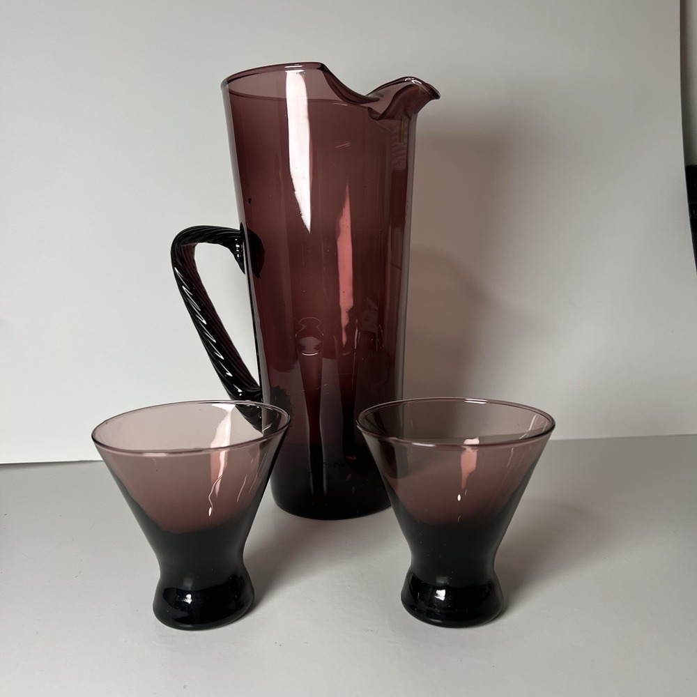 Hand blown amethyst glass pitcher W Applied Twisted Handle And Pair Of Glasses